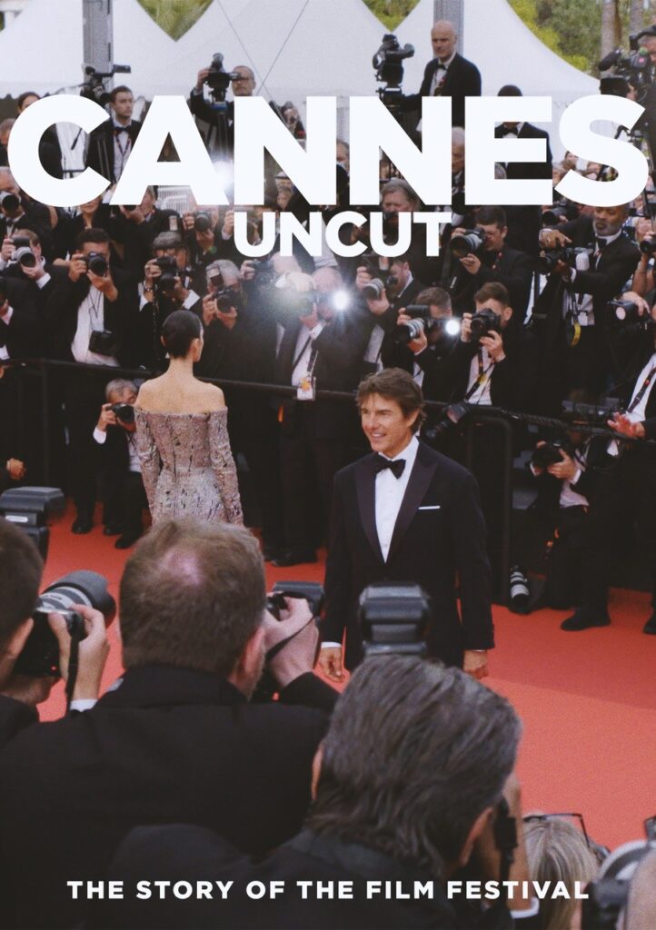 Poster for CANNES UNCUT. Tom Cruise is on the red carpet posing for photos in black tie. A woman in a dress is behind him with her back to us. The poster reads 'CANNES UNCUT' at the top and 'THE STORY OF THE FILM FESTIVAL' in smaller letters at the bottom.